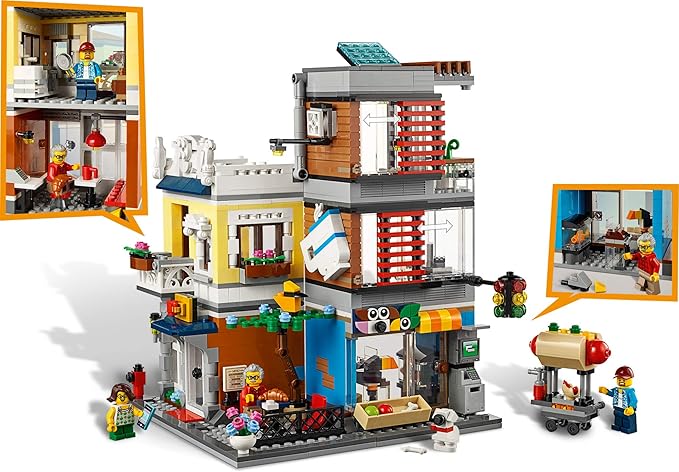 LEGO Creator 3 in 1 Townhouse Pet Shop & Café 31097 Toy Store Building Set with Bank Town Playset with a Toy Tram Animal Figures and Minifigures (969 Pieces)