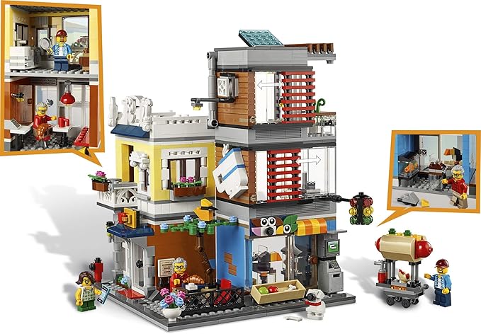 LEGO Creator 3 in 1 Townhouse Pet Shop & Café 31097 Toy Store Building Set with Bank Town Playset with a Toy Tram Animal Figures and Minifigures (969 Pieces)
