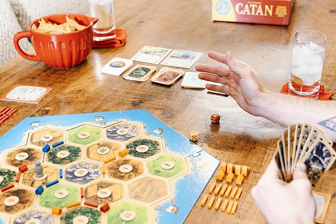 CATAN Cities & Knights Board Game Expansion - Enhance Your CATAN Experience with Intriguing New Challenges! Strategy Game for Family Ages 12+ 3-4 Players 90 Min Playtime Made by CATAN Studio