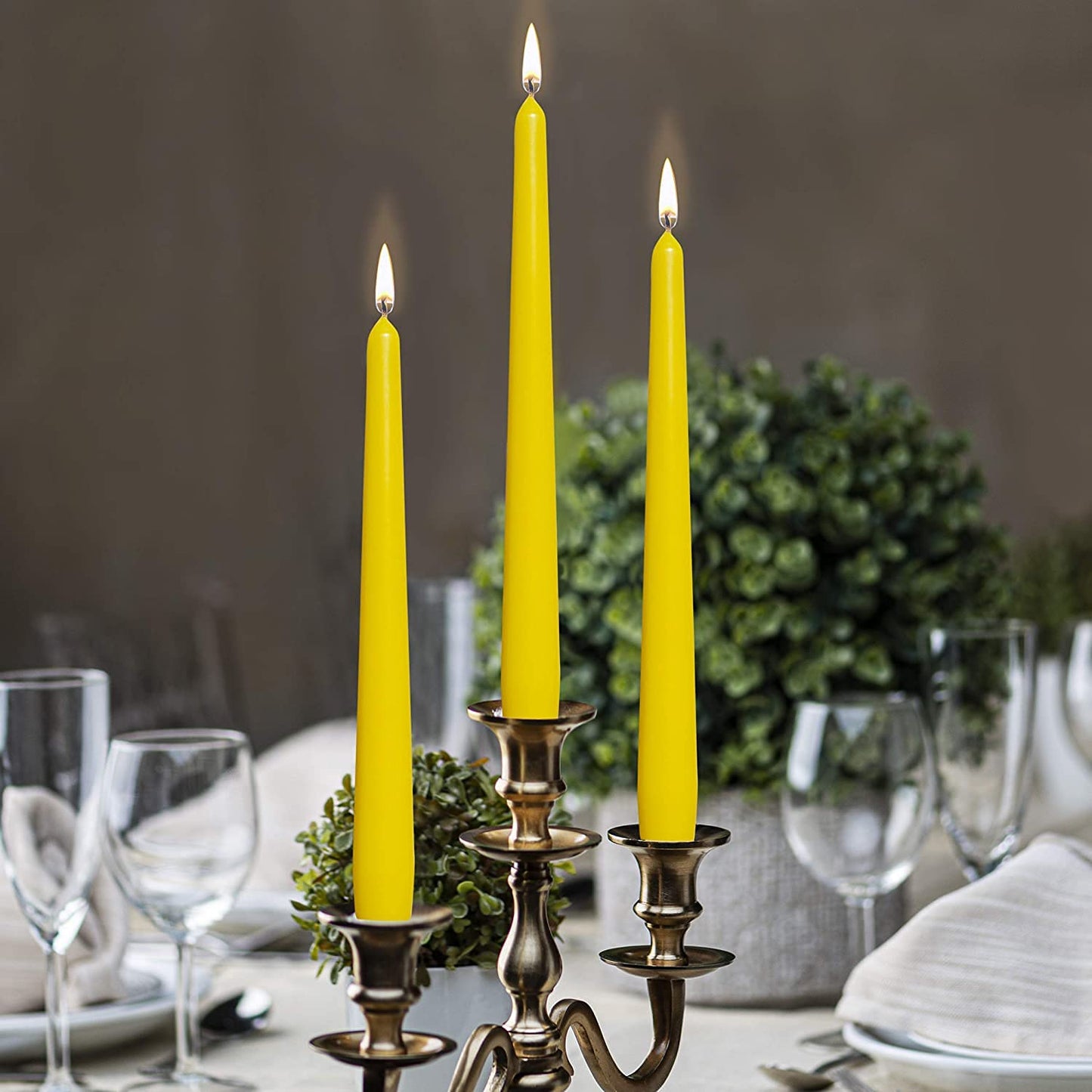 BOLSIUS Yellow Taper Candles - 4 Pack Unscented 10 Inch Dinner Candle Set - 8 Hours Burn Time - Premium European Quality - Smokeless and Dripless Household Wedding, Party, and Home Decor Candlesticks