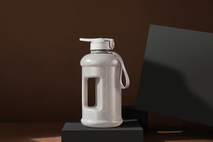 H2O Capsule INSPO Gallon Water Bottle with Time Marker and Straw Motivational Hydration Tracker Jug Big BPA-Free Food-Safe Leakproof Drinking Bottle with Handle & Strap, Lotus Blossom