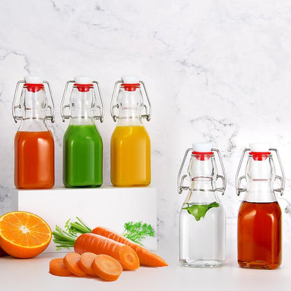 YEBODA 4oz Swing Top Glass Bottles,Small Flip Top Glass bottles with airtight Caps for Home Brewing,Kombucha,2nd Fermentation,Kefir,Beverages,Soda,Oils,Vinegar,Limoncello,Vanilla extract 12 Pack