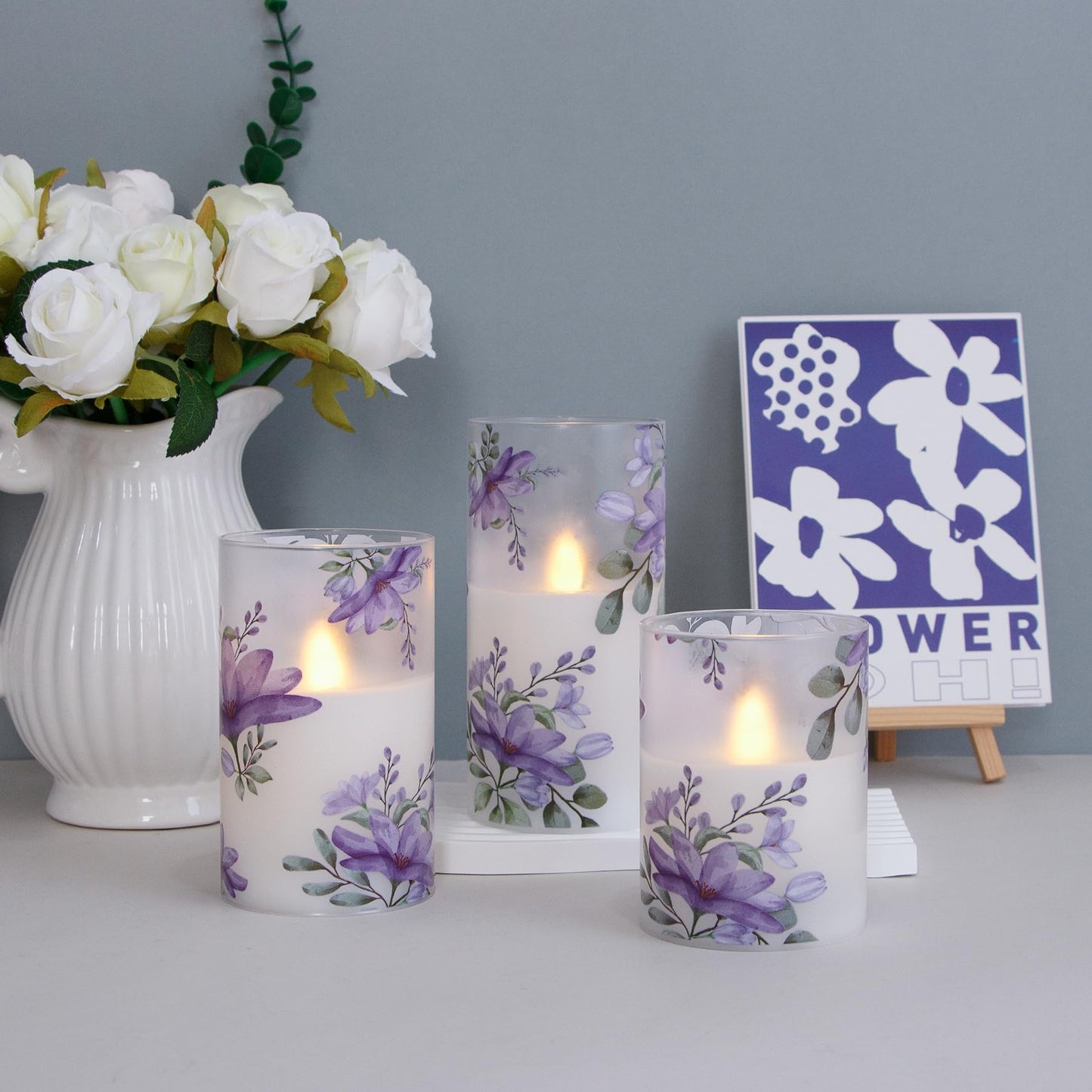 Mavandes Flameless Flickering Glass Candles with Remote and Timer,Purple Flowers LED Battery Operated Real Wax Set of 3 Realistic Wick Electric Pillar Candles,Warm Fire(3 x 4, 5, 6 Inches)