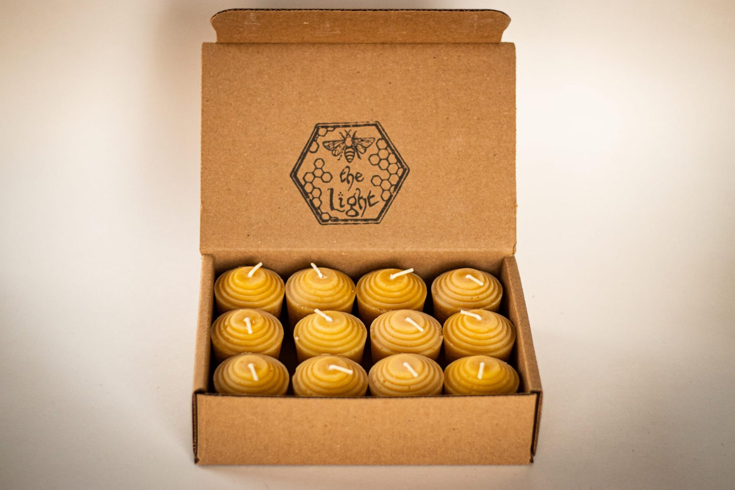 100% Pure Beeswax Votive Candles - USA-Sourced Handmade Votives for Home, Christmas, and Advent, Smokeless Unscented 12 Candle Set with Natural Honey Aroma, 1.96 x 1.77 Inches, by BeeTheLight