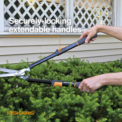 Fiskars Power-Lever Extendable Hedge Shears, Self-Sharpening Serrated Steel Blades for Clean Cuts, Handles Adjust 25"-33" for High Reach, Multiplies Leverage for 2x Power, 10" Blades, Orange/Black